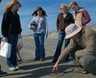 Students on beach cario